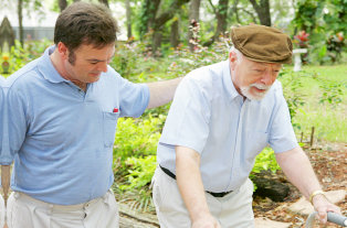 caregiver taking care old man