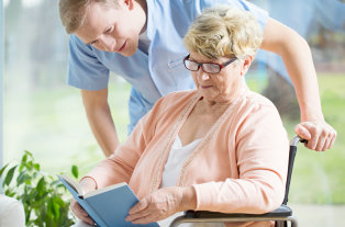 old woman reading books